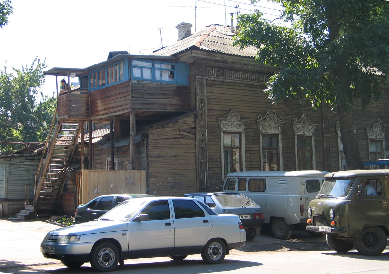 A wooden balcony on a residential building