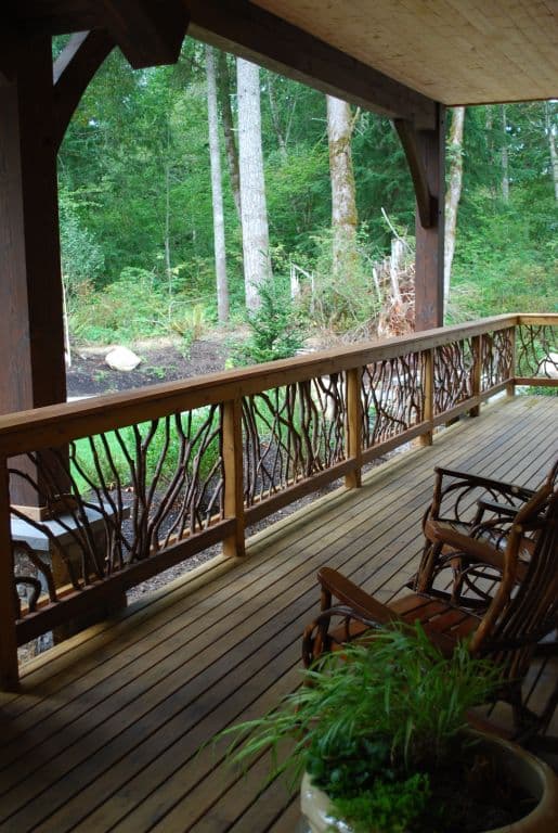 Timber Frame porch with Mountain Laurel Handrail.