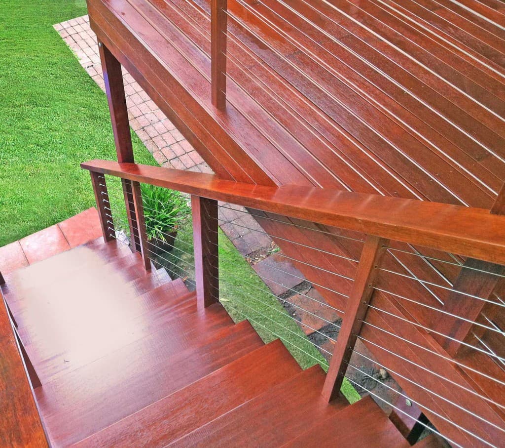 A timber deck being oiled in Brisbane weather, used to illustrate deck oiling