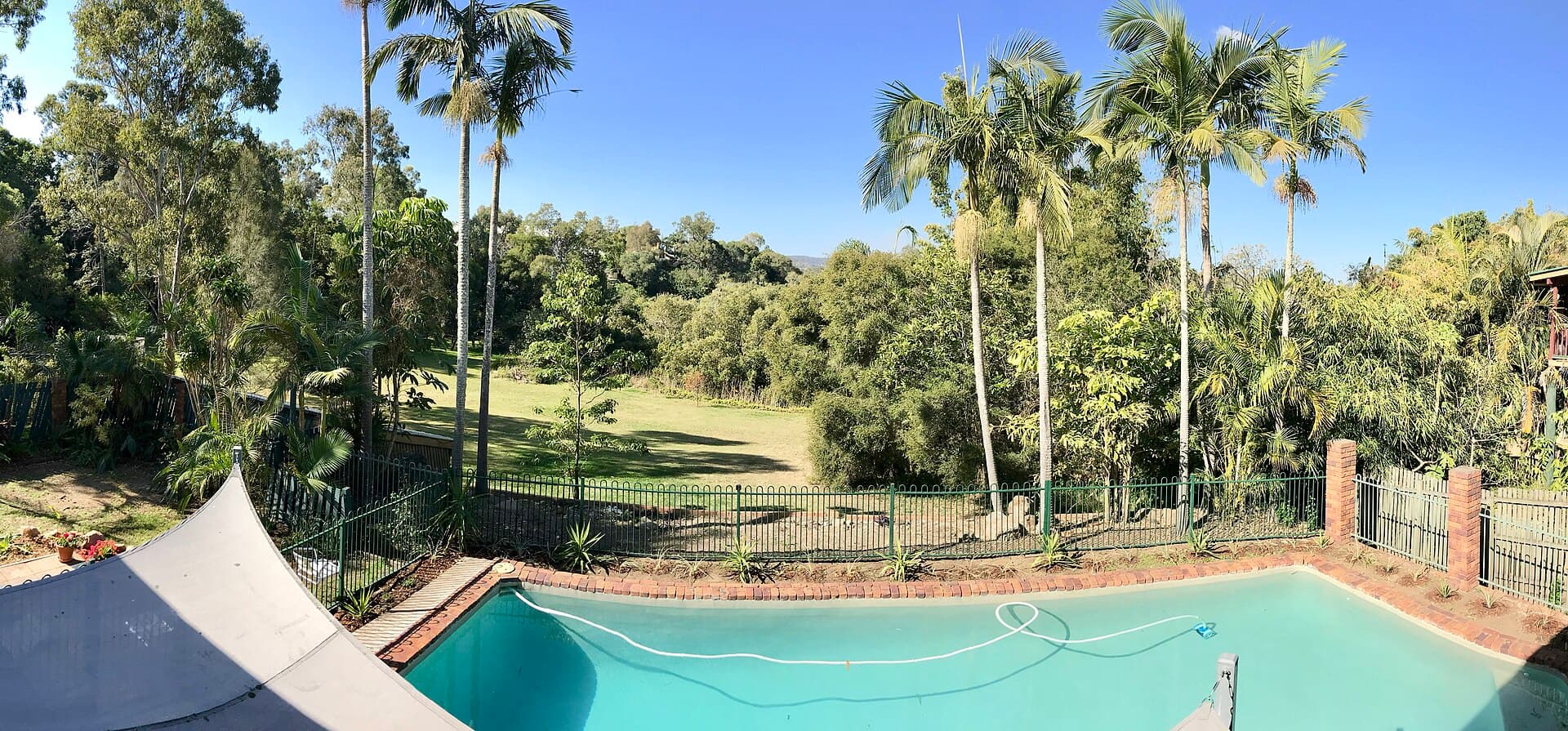 A backyard house and swimming pool