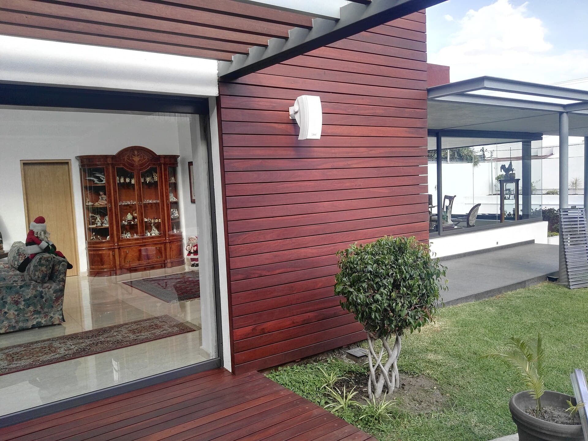 A house facade with an outdoor wooden deck
